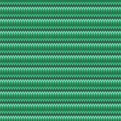 Green knitted seamless tileable pattern. Knitted fabric texture. Realistic knit texture for wallpaper, background, wrapping paper.