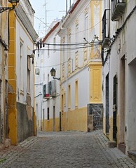 Typical narrow, historic streets in the old town of Elvas, Alentejo - Portugal 