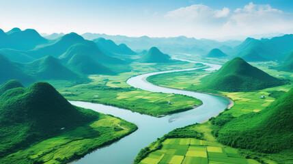 areal view of landscape with river and mountains.