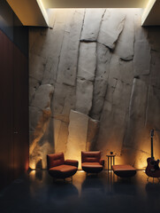 Contemporary interior design, architectural space. Rough texture of dark stone walls, leather armchairs, guitar, warm glowing orange underlighting and skylight in the ceiling.