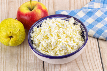 Organic cottage cheese in the bowl