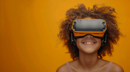 Happy young child wearing virtual reality glasses stands against vibrant yellow backdrop, immersed in cutting-edge VR technology. Copy space