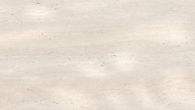 Marble surface visible through the waves of clear water	