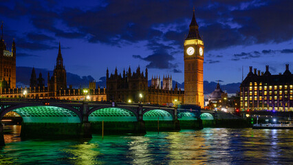 Night at Westminster Bridge and Elizabeth Tower with reflection in  River Thames