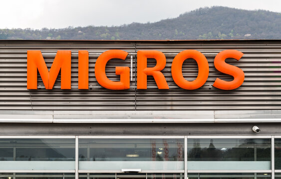 Agno, Ticino, Switzerland - April 9, 2024: View of the Migros supermarket in Agno, it is the largest supermarket chain in Switzerland
