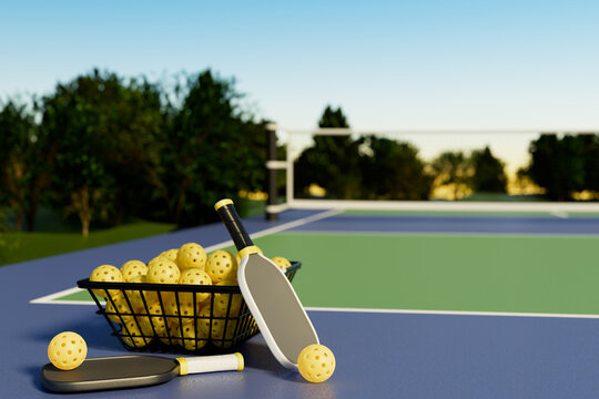 Pickleball rackets and balls in a basket on an outdoor court in a park. 3d rendering.