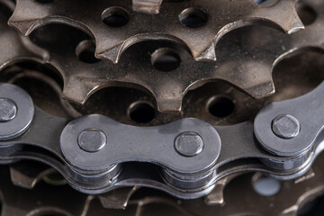Closeup of bicycle chain and cogwheels. Selective focus.