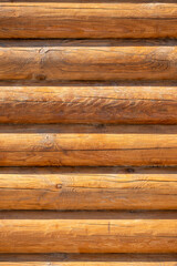 Obraz premium Wooden wall of the log house. Abstract background and texture for design.