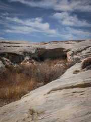 Grey sandstone rock formations in Page Arizona desert in Glen Canyon National Recreation Area