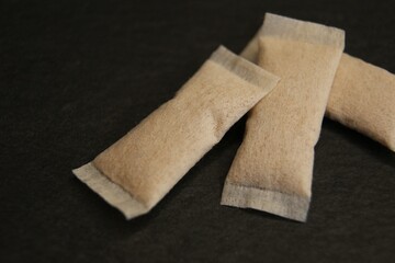 Nicotine snus on dark background close-up. High quality photo