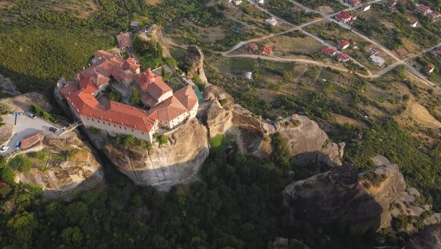Aerial top view of Monastery of Saint Stephen (Agios Stefanos Monastery) in Meteora, Greece. St. Steven Monastery, a UNESCO World Heritage site.