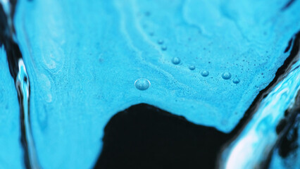Ink emulsion. Shimmer flow mix. Defocused blue black color drip oil paint wet gloss glitter liquid blend wave motion abstract art background. - 780820727