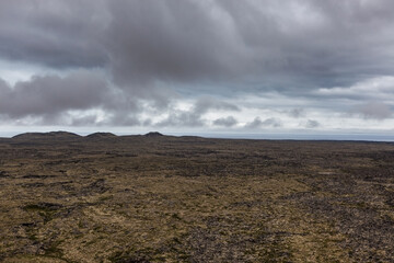 Lava fields and dramatic landscape in Iceland. Empty desolate Icelandic view.