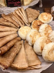 Cheesecakes and crepes on plate