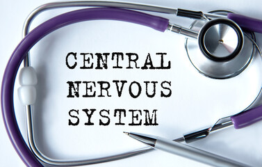 CENTRAL NERVOUS SYSTEM - words on white background with pen and stethoscope