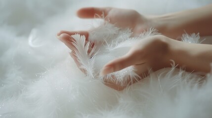 Person holding a white feather, versatile image for various projects