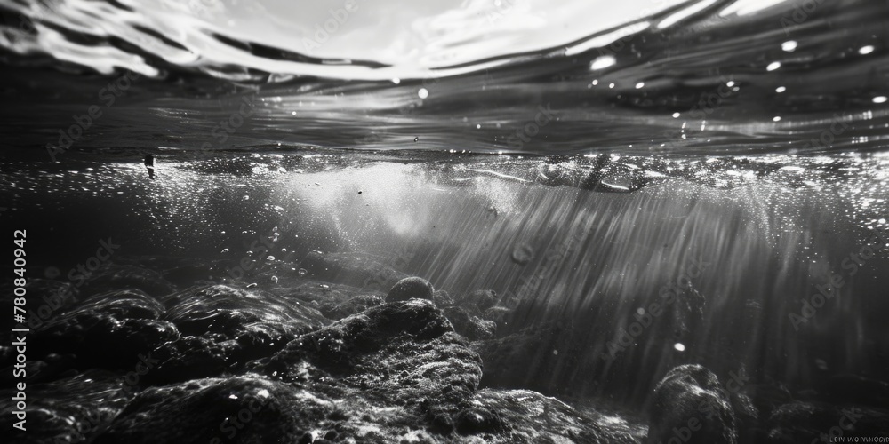 Poster monochrome image of water and rocks, suitable for various projects
