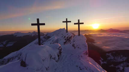 Three crosses on top of a snow-capped mountain at a beautiful sunrise. - obrazy, fototapety, plakaty