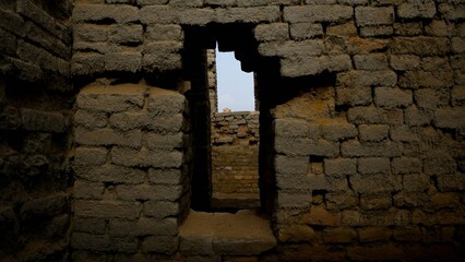 Ancient stone wall with window opening Mohenjo Daro