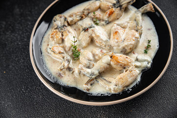 frog legs food French cuisine second course shriveled Cooking appetizer meal food snack on the table copy space food background