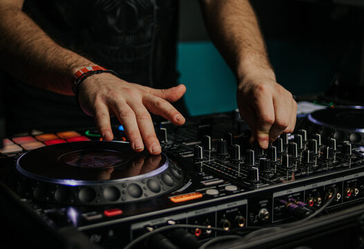 Close-up of DJ Mixing Music on Professional Equipment
