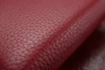Beautiful red leather as background, closeup view