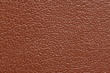 Brown natural leather as background, top view