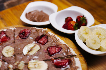 Sweet pizza with nutella a fruits