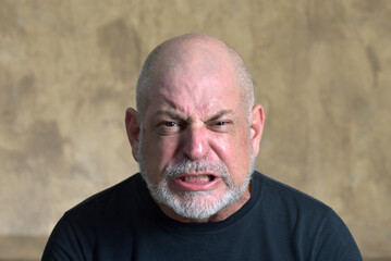 portrait adult man bald white beard face expression anger scared thoughtful male model gentleman in black clothes image
