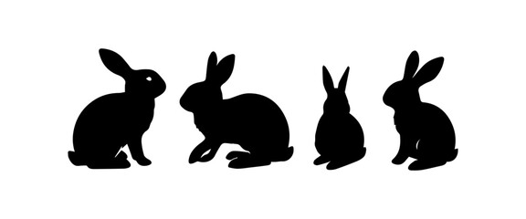 Silhouettes of easter bunnies isolated on a white background. Set of different rabbits silhouettes for design use.