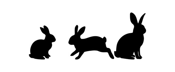 Silhouettes of easter bunnies isolated on a white background. Set of different rabbits silhouettes for design use.