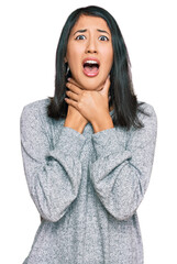 Beautiful asian young woman wearing casual clothes shouting and suffocate because painful strangle. health problem. asphyxiate and suicide concept.