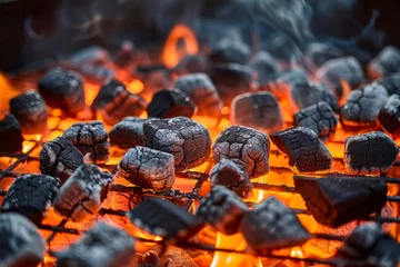 Schilderijen op glas Barbecue Grill Pit With Glowing And Flaming Hot Charcoal Briquettes. © Hunman