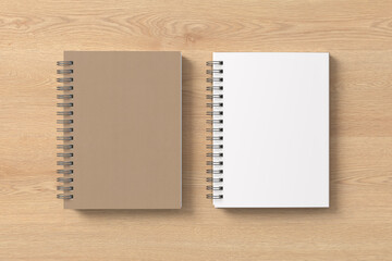 Notebook mockup. Closed and open blank notebook with craft paper cover. Spiral notepad on wooden background