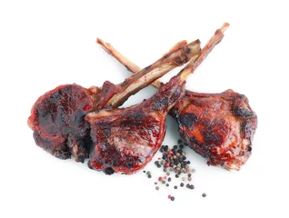 Fotobehang Pieces of delicious grilled beef meat and peppercorns isolated on white, top view © New Africa