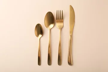 Foto op Plexiglas Stylish cutlery set on beige table, flat lay © New Africa