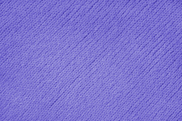 Purple knitted woolen jersey fabric with diagonal weaving, sweater, pullover texture background. Fabric abstract backdrop, cloth wallpaper