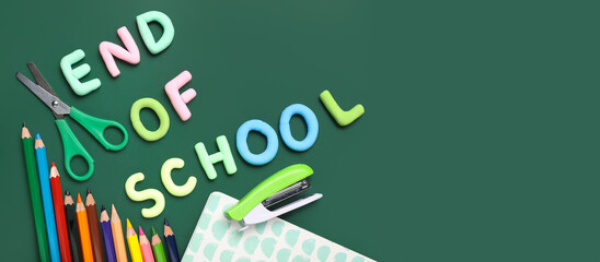 Text END OF SCHOOL, pencils and scissors on green background. Top view