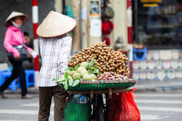 tropical spices and fruits sold at a local market in Hanoi (Vietnam) - 780891559