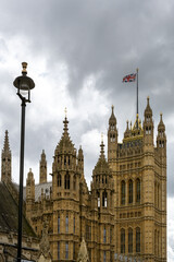 Fototapeta na wymiar Victoria Tower of Houses of Parliament on a cloudy day, London, England