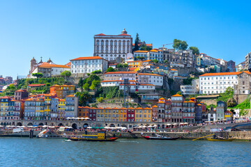 Beautiful colorful building facede in Porto Portugal next to Duero river in Ribeira - obrazy, fototapety, plakaty