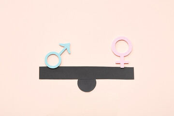 Scales with female and male gender symbols on pink background. Gender equality concept