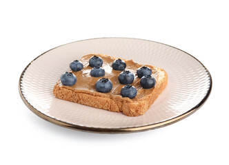 Plate of toast with peanut butter and blueberries on white background
