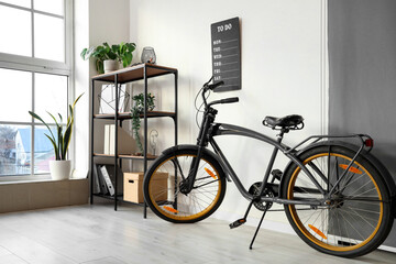 Modern bicycle in interior of office