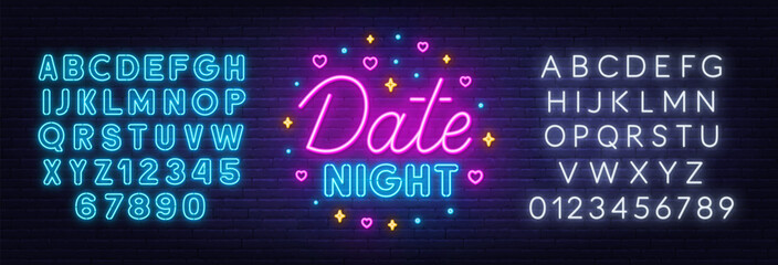 Date Night Neon Sign on brick wall background.