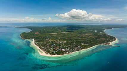 Aerial drone of tropical island with a beautiful beach. Kota Beach. Bantayan island, Philippines.