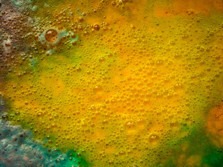 abstract background of multi-colored bubbling liquid