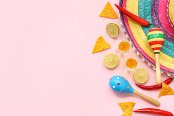 Shots of tequila and sombrero hat on pink background