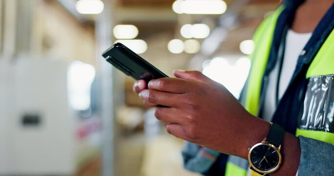 Construction, warehouse and closeup of architect with smartphone for research, networking or update on project. Employee, depot and typing on technology for ecommerce, discussion or text message