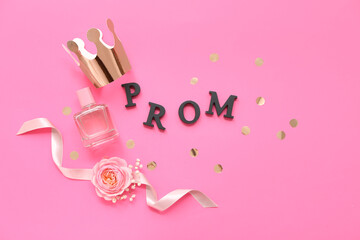 Word PROM with crown perfume bottle and boutonniere on pink background